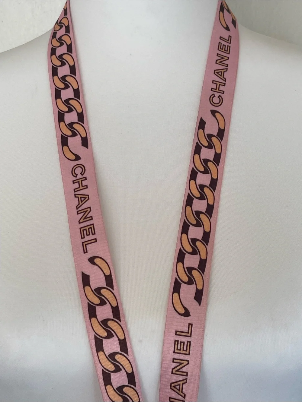 CHANEL Pink Chain-Print Lanyard with Gold Hardware